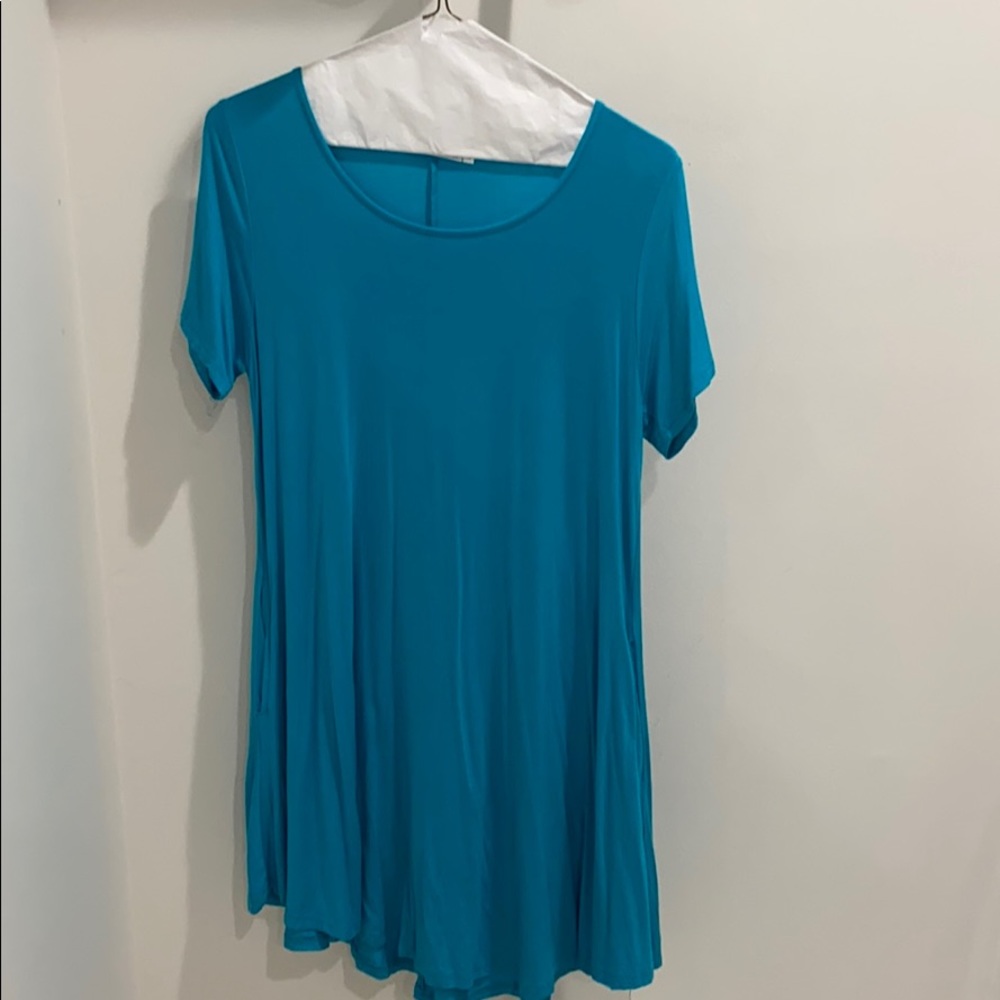 JollieLovin swing dress with pockets. Never worn